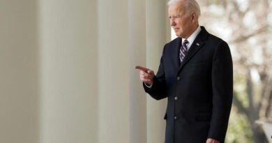 U.S. President Joe Biden enters the Rose Garden to sign into law H.R. 55, the