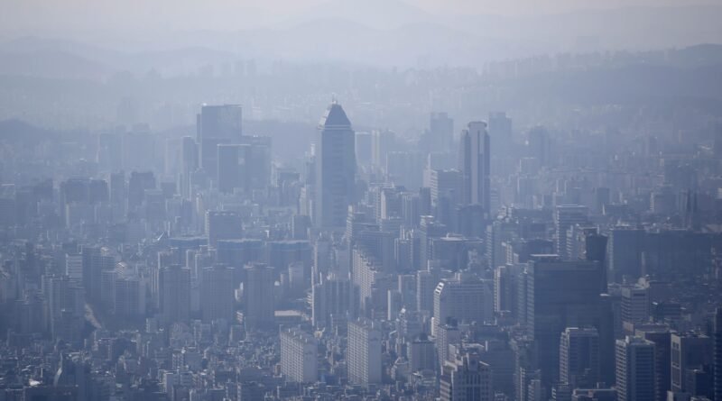 The skyline of central Seoul is seen during a foggy day in Seoul March 4, 2015. South Korea