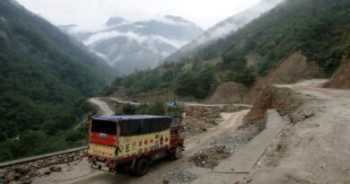 FILE PHOTO: A liquefied petroleum gas (LPG) delivery truck drives along India