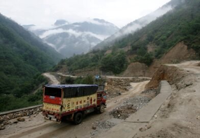 FILE PHOTO: A liquefied petroleum gas (LPG) delivery truck drives along India