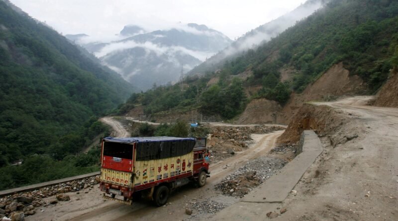 FILE PHOTO: A liquefied petroleum gas (LPG) delivery truck drives along India